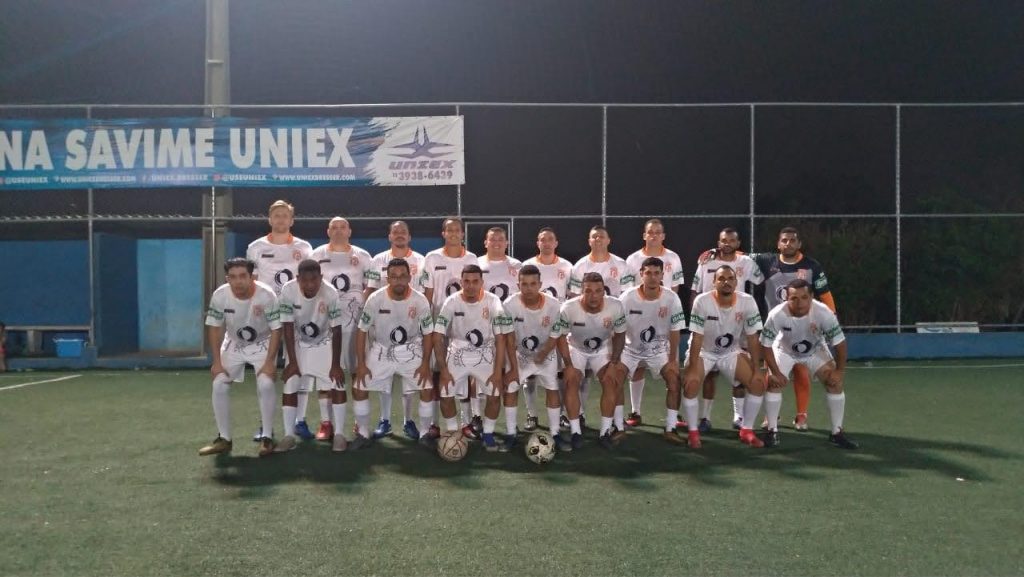group of racially mixed soccer players standing together as brothers united